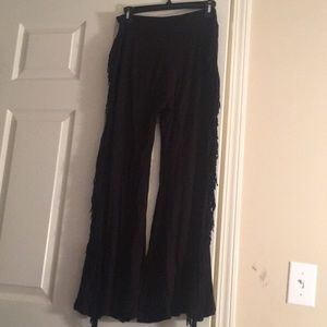 Loose black fringe pants